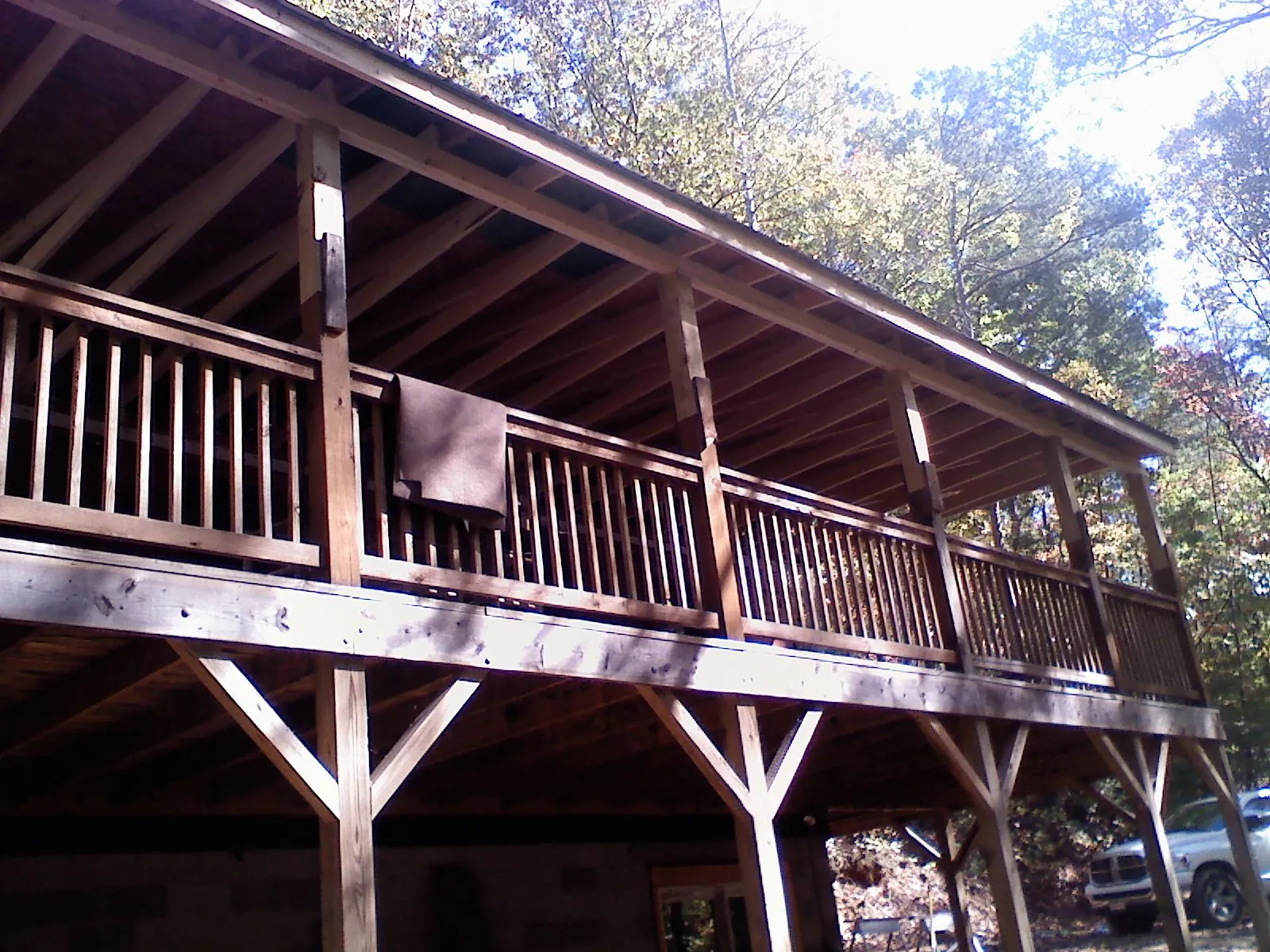 Timber framing under a new elevated porch and deck — Roof Leak Repair in Moultonborough by Roofing Brothers